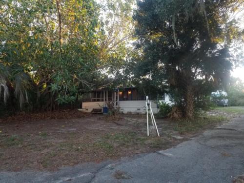 The front yard with leaves cleaned up