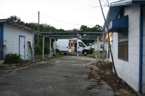 The driveway between the shop and house